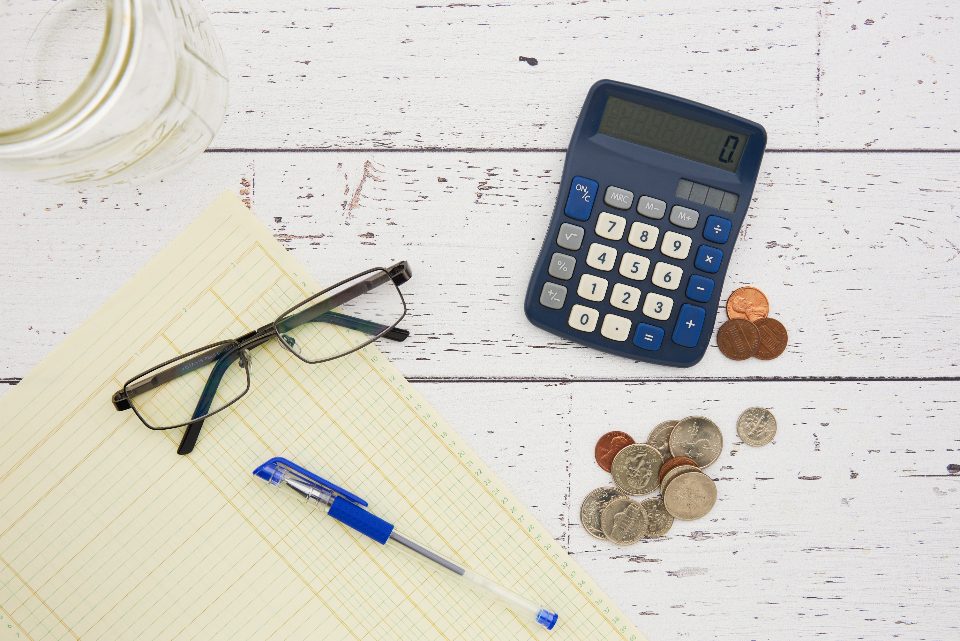 Alternative credit options and a calculator with bills