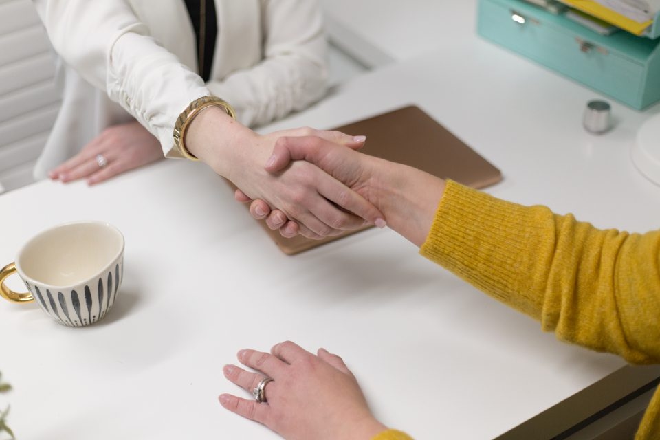 Credit score report and partnership handshake